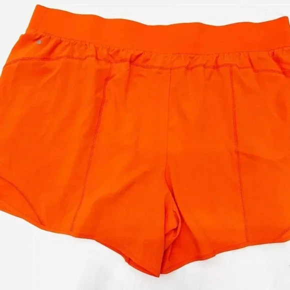 NWT TEK GEAR Women Mid Rise Drawstring Pockets Workout Orange Shorts Plus Sz 3X - Picture 2 of 4